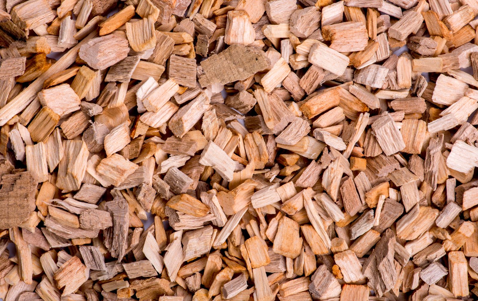 Pile of fresh wood chippings from tree work